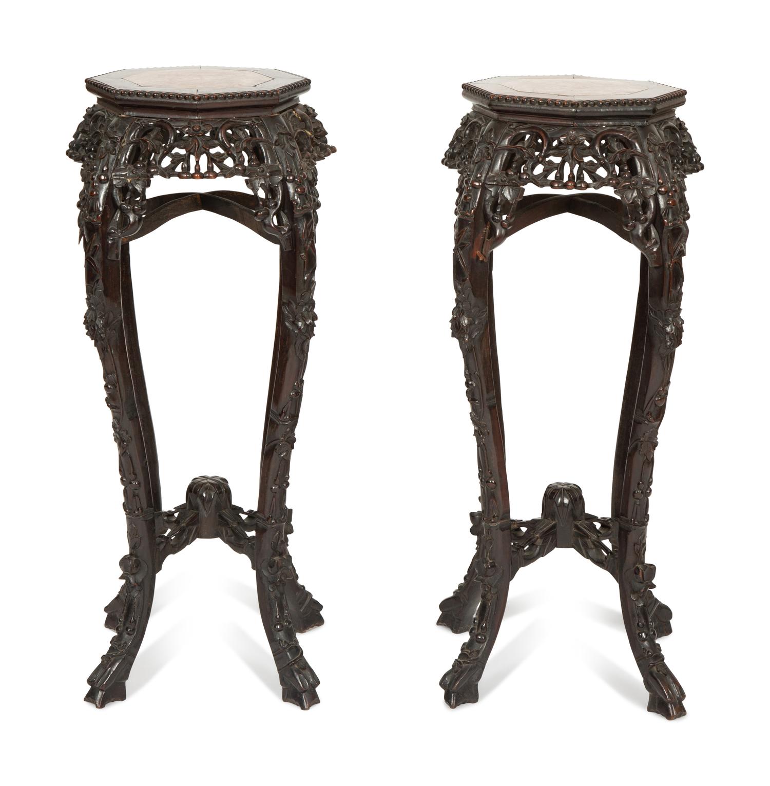 A Pair of Chinese Carved Rosewood Pedestals