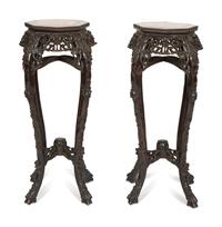 A Pair of Chinese Carved Rosewood Pedestals
