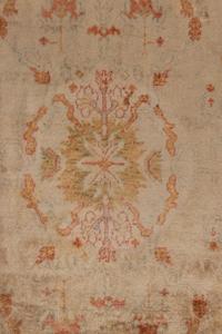 An Oushak Wool Rug