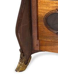 A Louis XIV Gilt Bronze Mounted Walnut and Oysterwood Commode