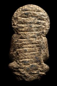 A Gandharan Grey Schist Figure of Seated Buddha