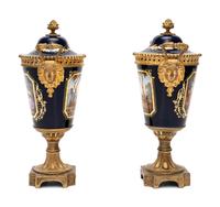 A Pair of Sèvres Style Gilt Bronze-Mounted Porcelain Urns