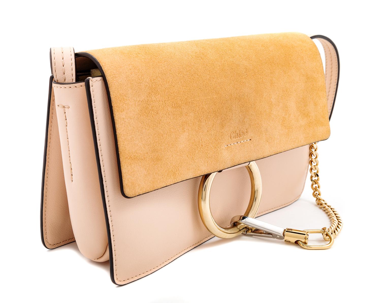 A Chloe Cement Pink Faye Small Shoulder Bag, 6.3" H x 9.4" W x 3.5" D; Strap drop: 20.1"-22.4".