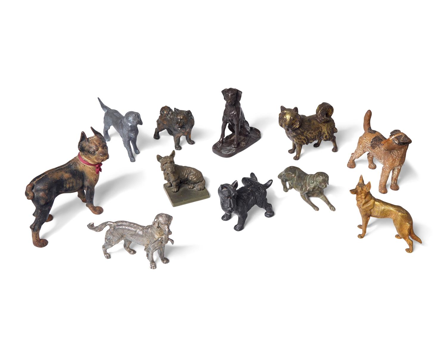 A Collection of Eleven Cast and Painted Metal Dog Figures