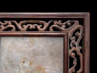 A Chinese Greyish White Jade Inset Hardwood Mounted Panel