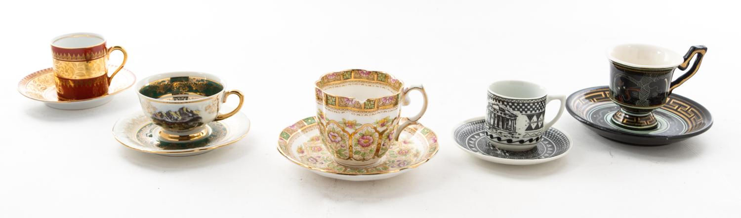 A Group of Continental Porcelain Teacups and Saucers Height of tallest teacup 2 3/4 inches.