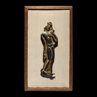A Thai Parcel Gilt Bronze Relief of a Walking Buddha, 16th-17th Century
