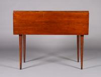 An American Maple Drop-Leaf Table, Height 29 x width 36 x depth 17 7/8 inches.