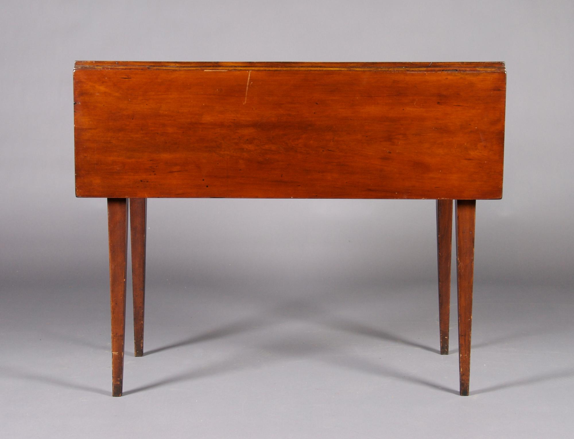 An American Maple Drop-Leaf Table, Height 29 x width 36 x depth 17 7/8 inches.