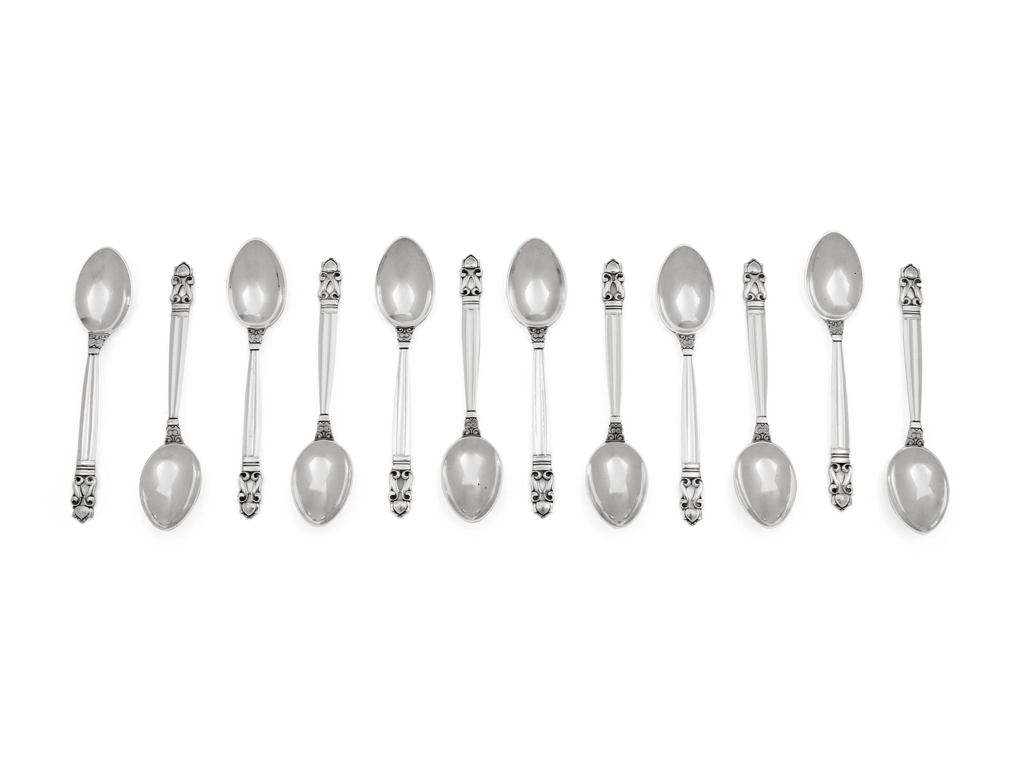 A Set of Twelve Georg Jensen Silver Coffee Spoons
