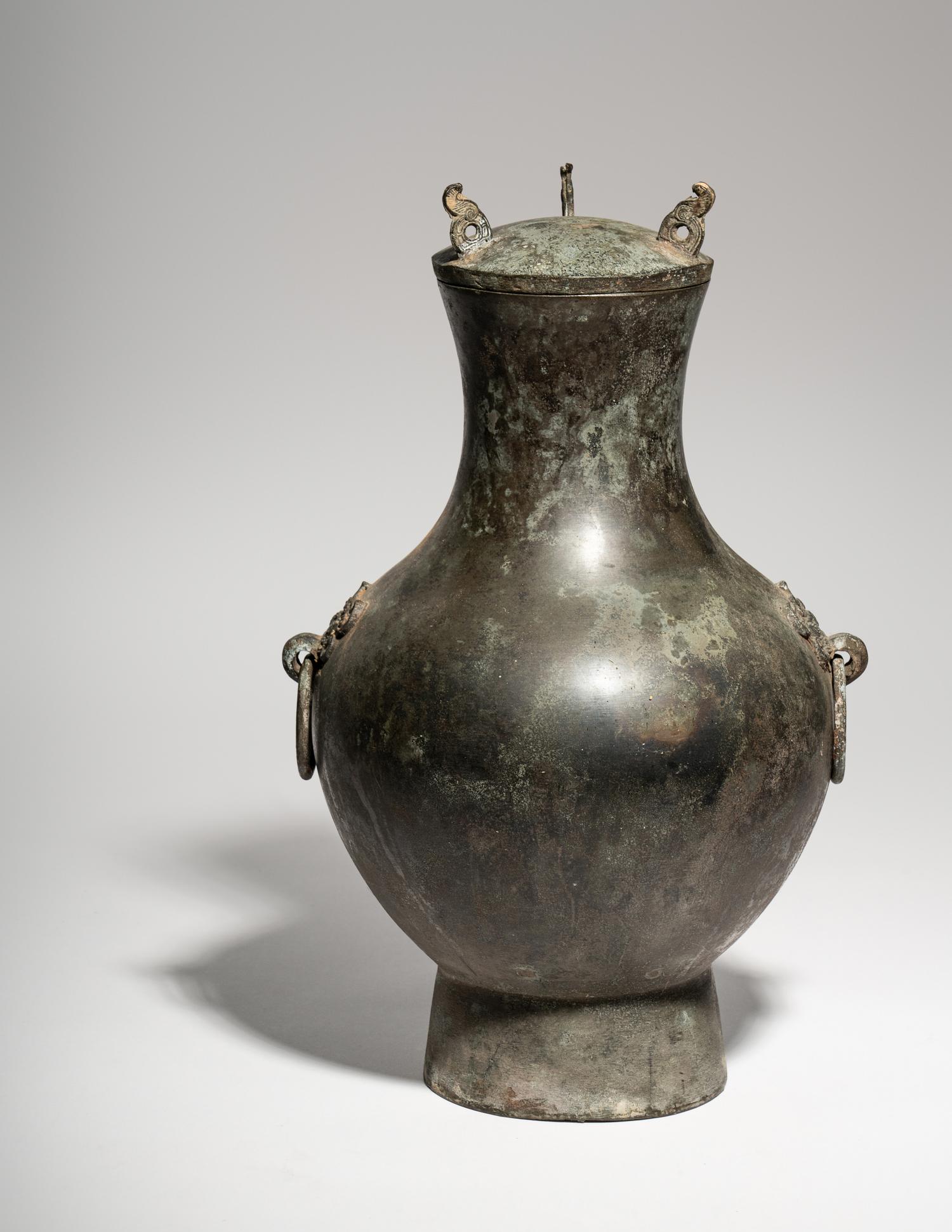 An Archaic Bronze Covered Hu Vessel
