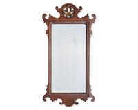 A Chippendale Fret-Carved and Parcel-Gilt and Inlaid Mahogany Mirror