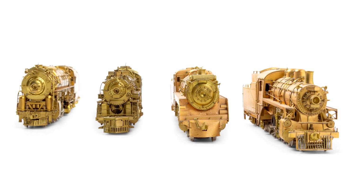 A Group of Four Brass HO-Gauge Locomotives and Tenders