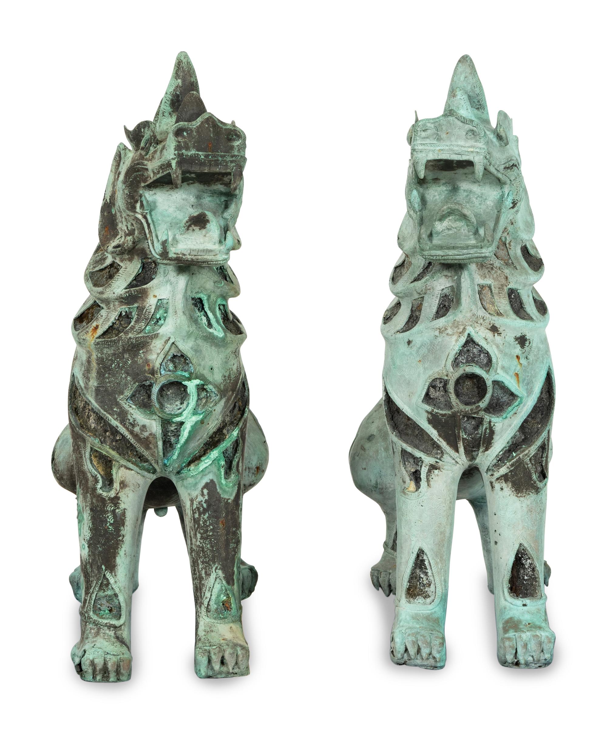 A Pair of Large Patinated Bronze Temple Lions