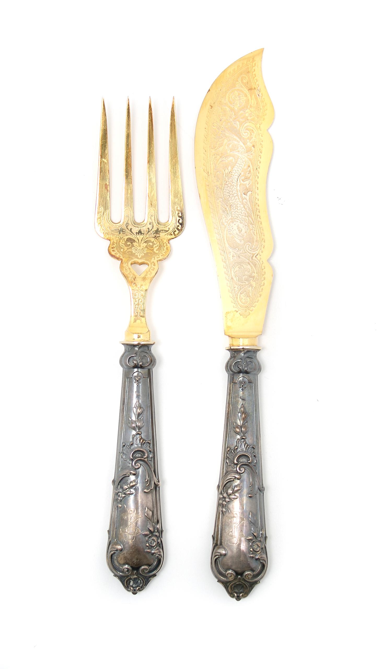 A German Silver Two Piece Fish Set, Length of largest 11 inches.