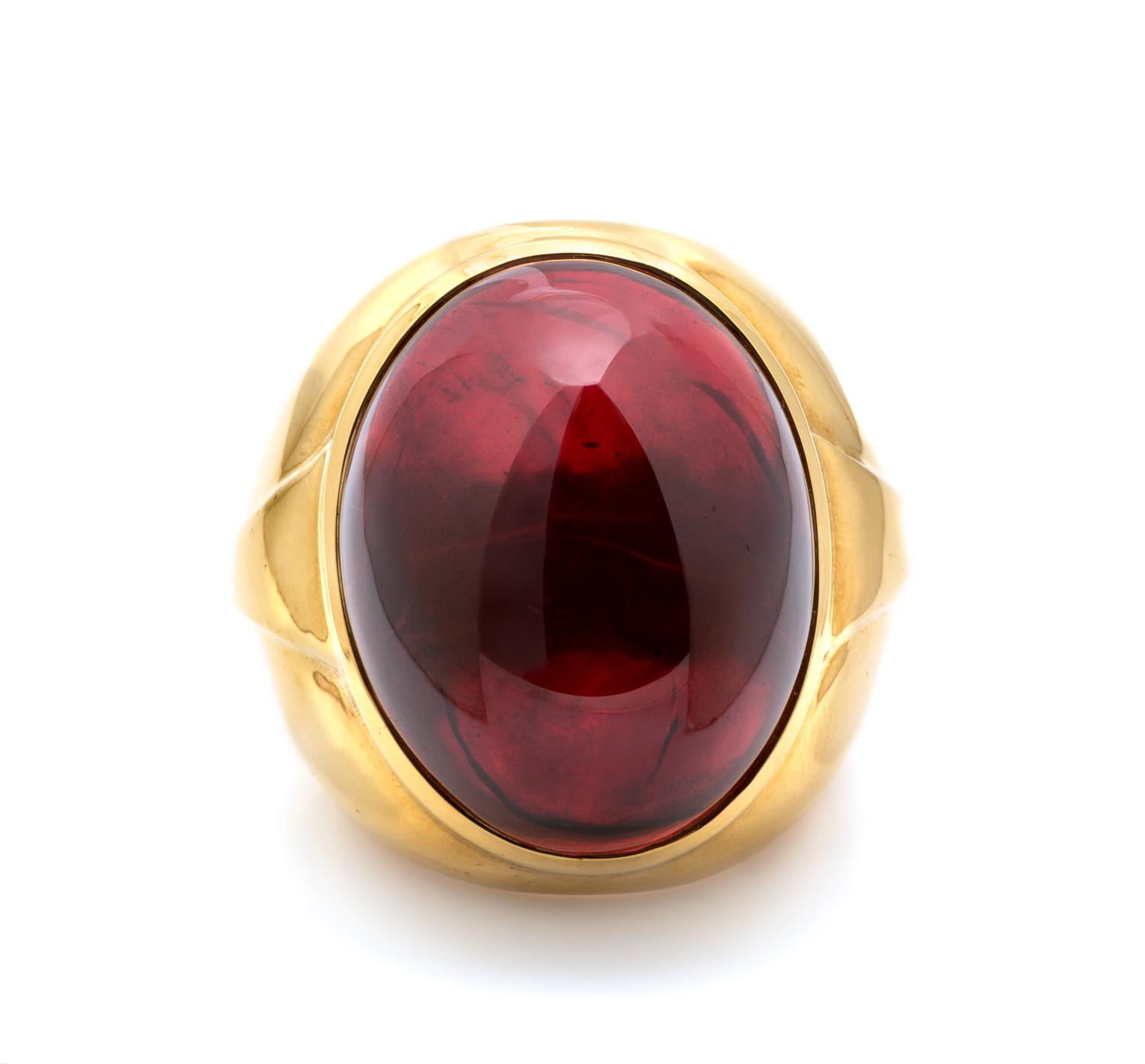 An 18 Karat Yellow Gold and Garnet Ring, 33.70 dwts.