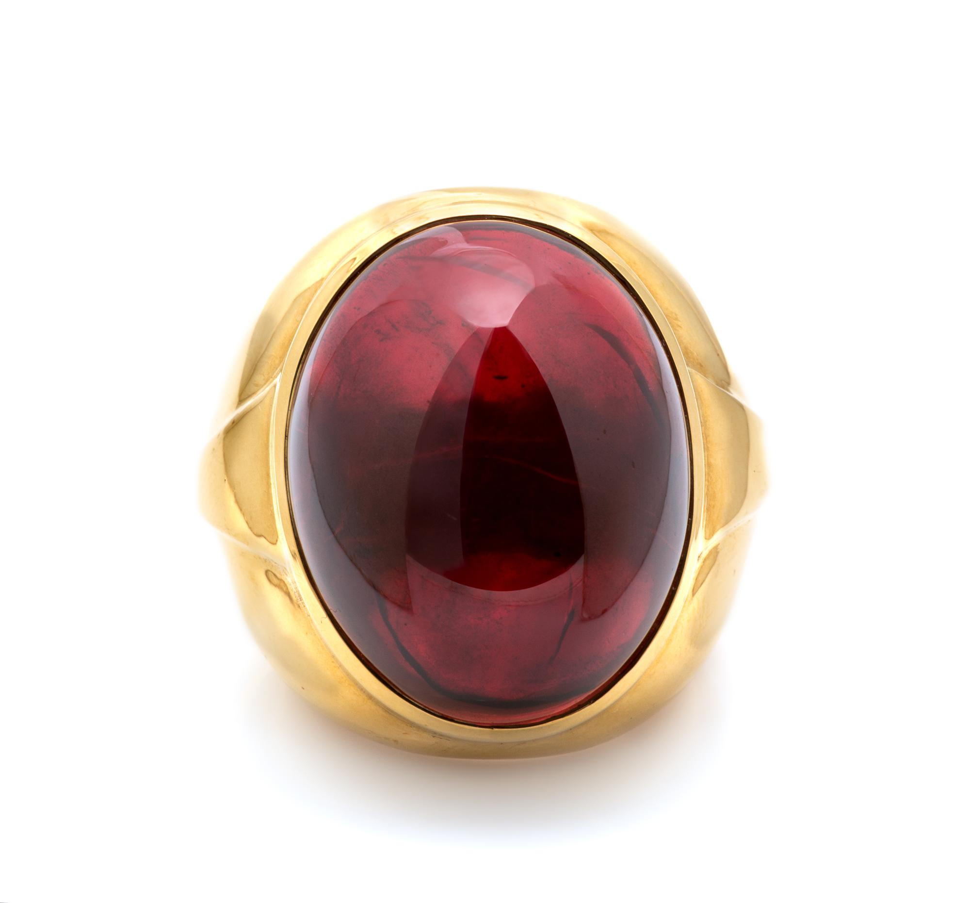 An 18 Karat Yellow Gold and Garnet Ring, 33.70 dwts.