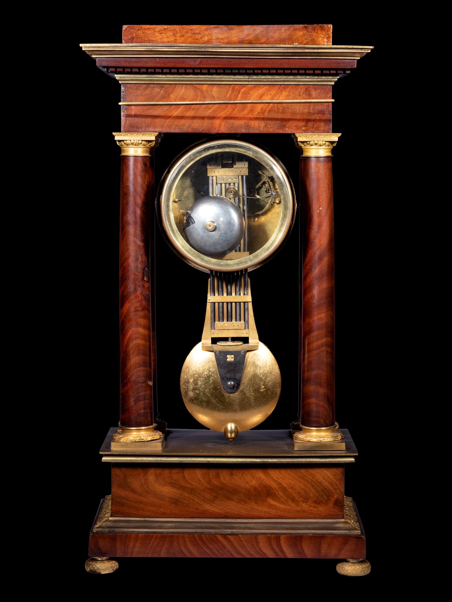 A French Gilt Bronze Mounted Mahogany Portico Clock, Ferrenbach, Chalons
