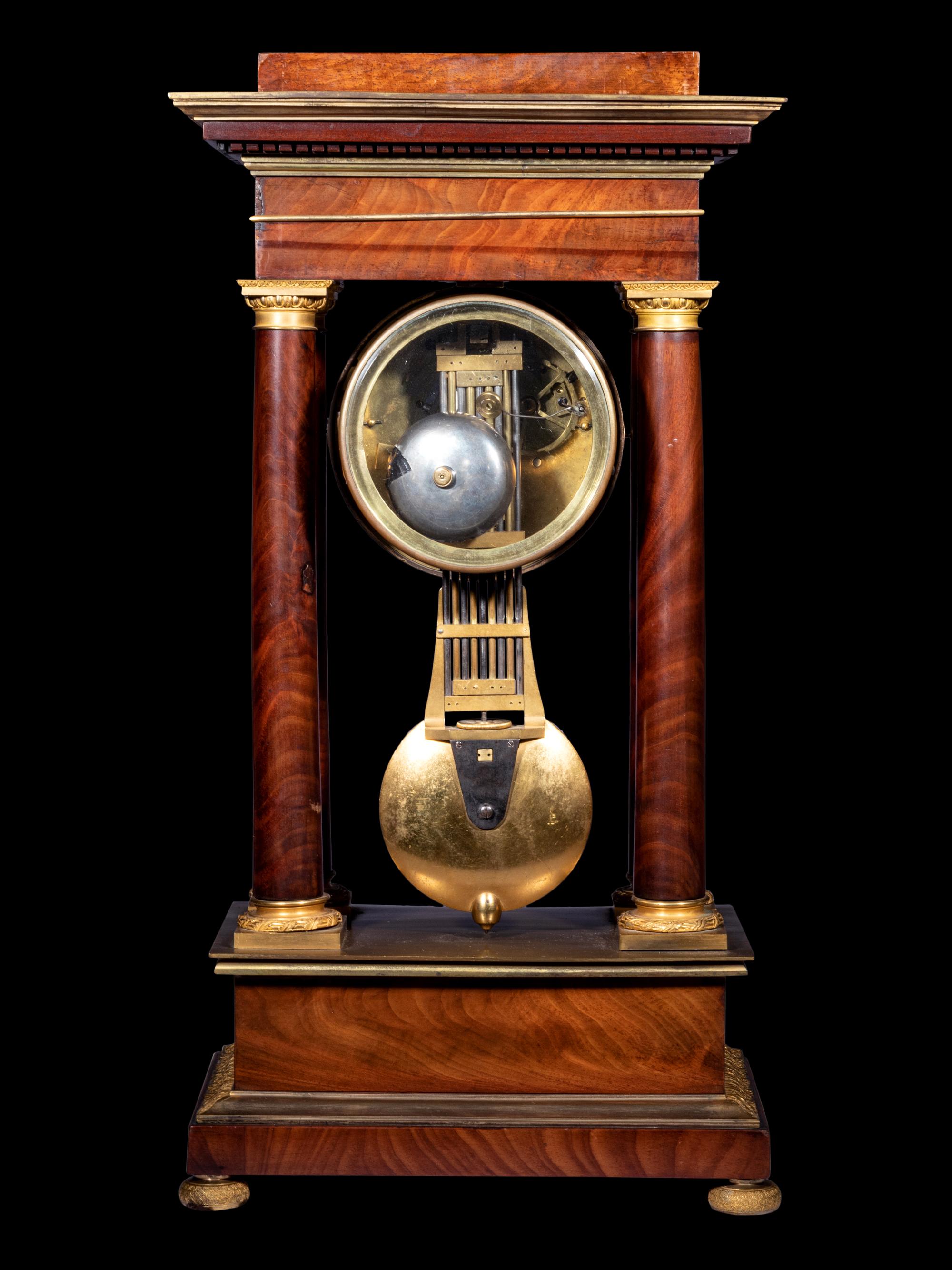 A French Gilt Bronze Mounted Mahogany Portico Clock, Ferrenbach, Chalons