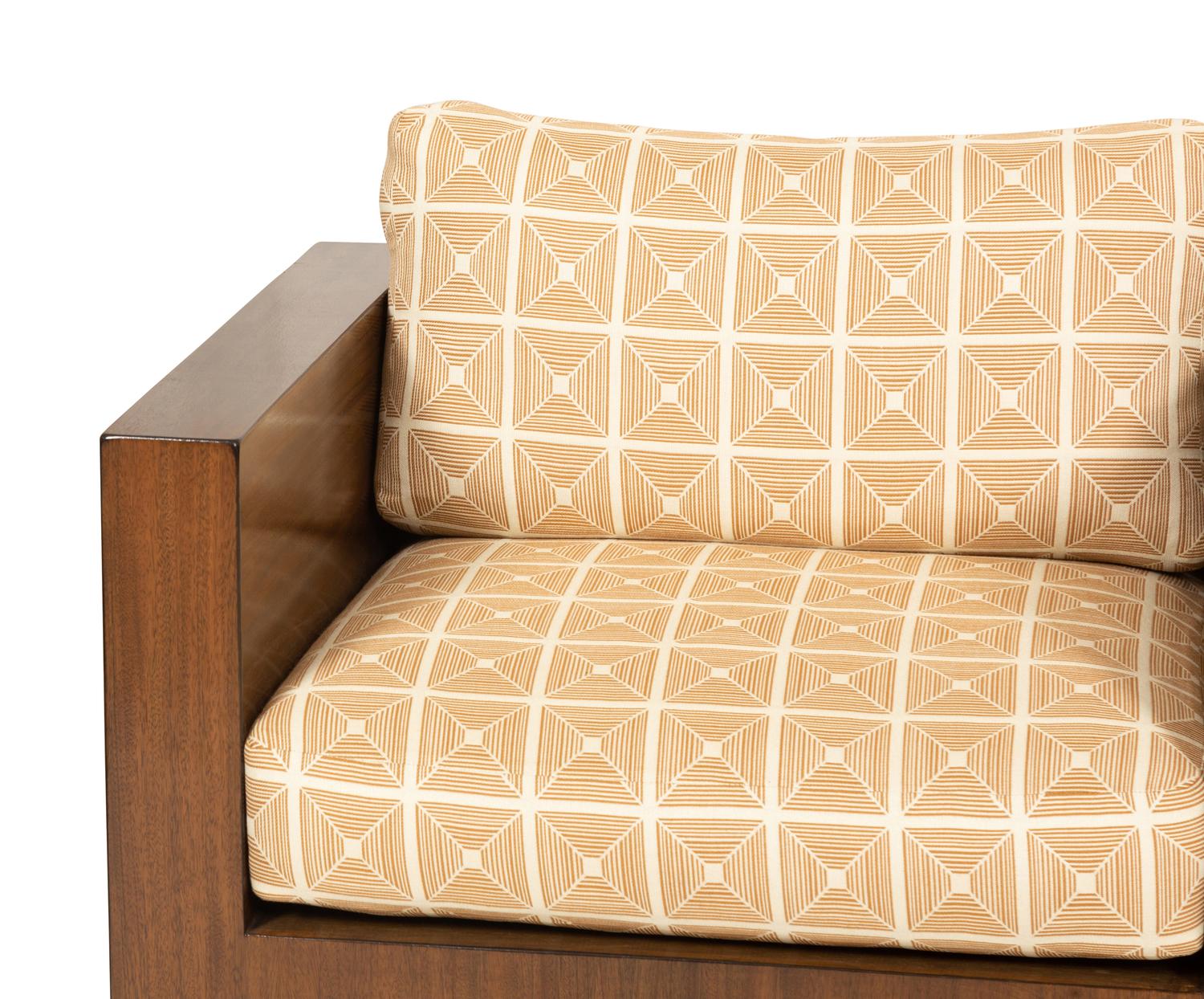 A Pair of Modernist Walnut Club Chairs