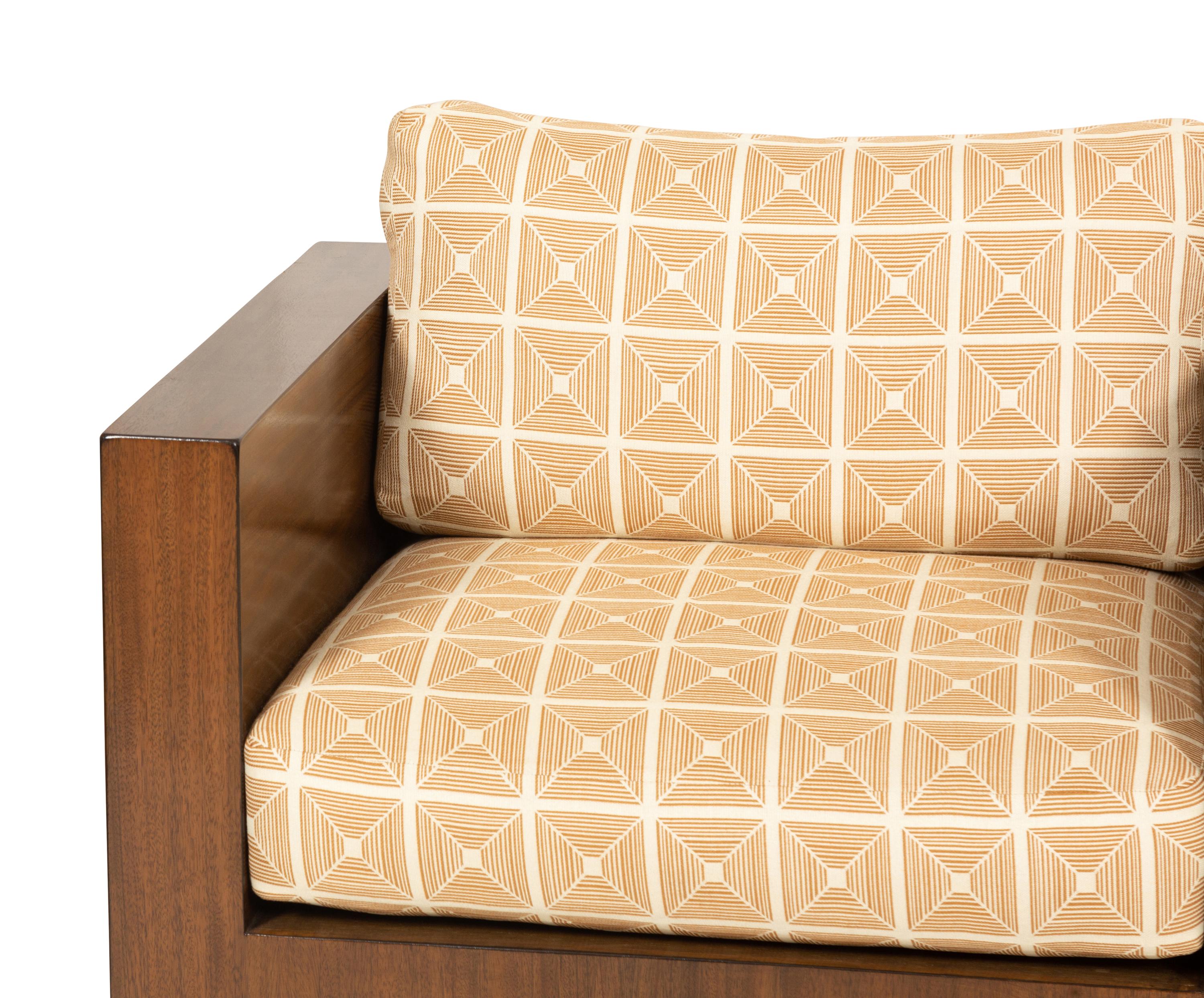 A Pair of Modernist Walnut Club Chairs