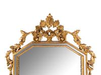 An Italian Baroque Style Giltwood Mirror