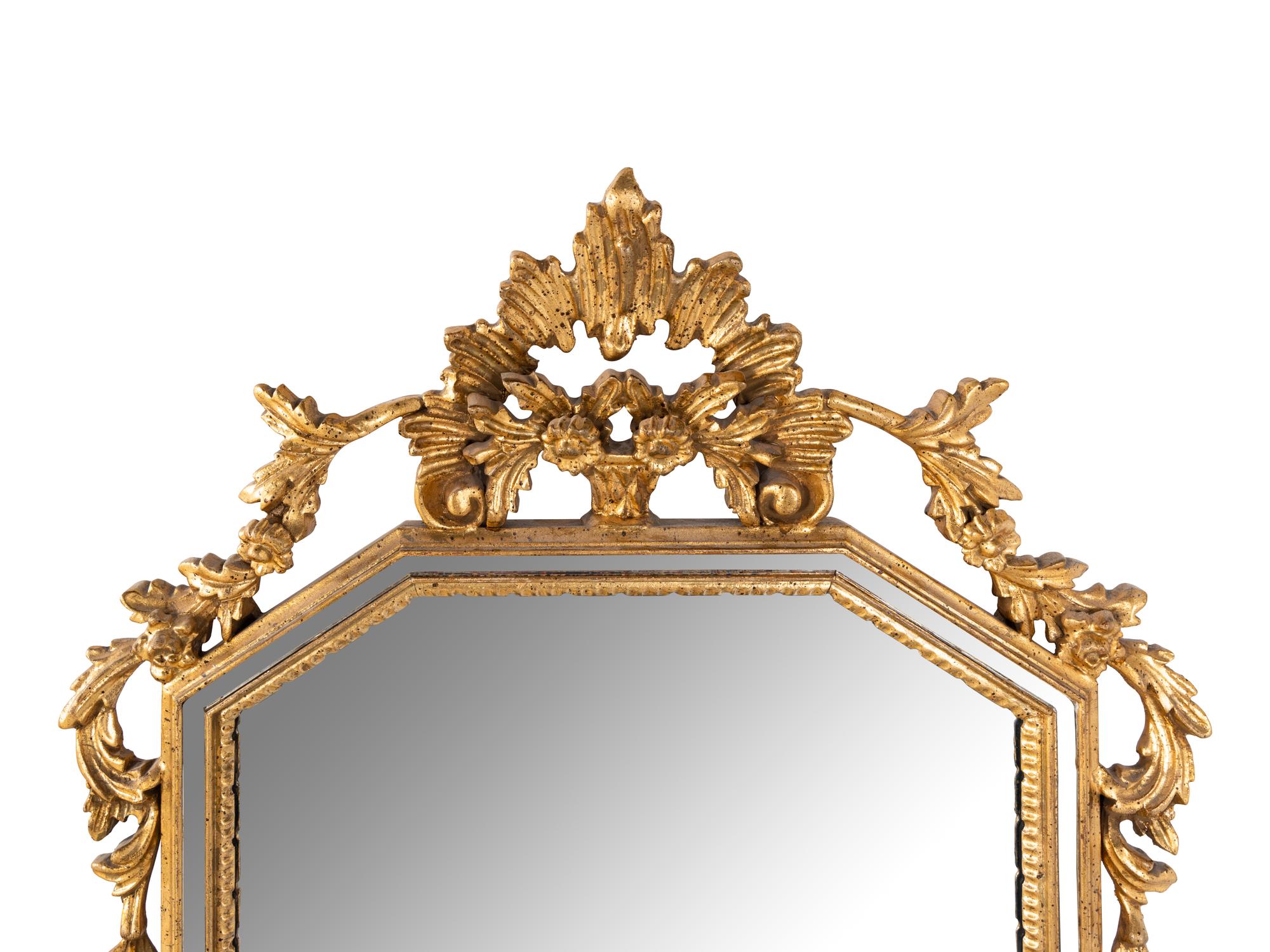 An Italian Baroque Style Giltwood Mirror