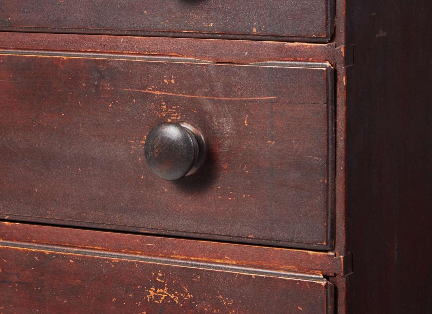 A red-painted pine tall chest, New England, circa 1800