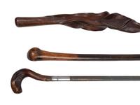Three Carved Walnut Walking Sticks