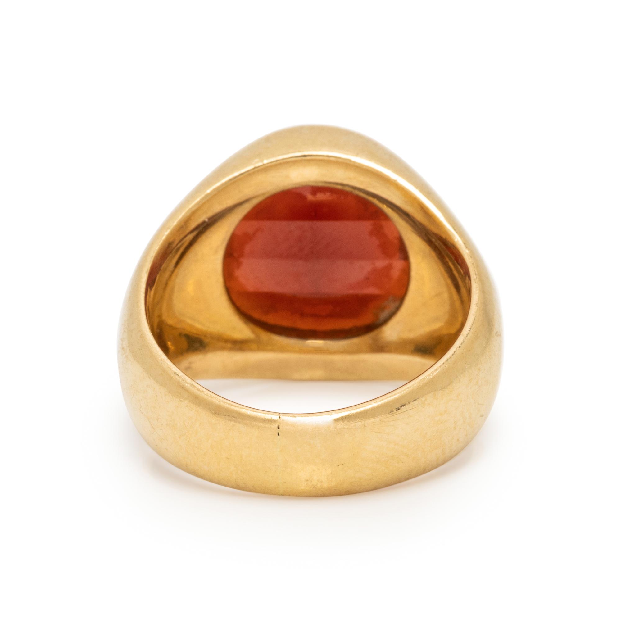 YELLOW GOLD AND GARNET RING