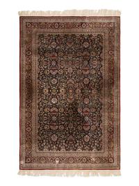 A Silk Tabriz Rug
