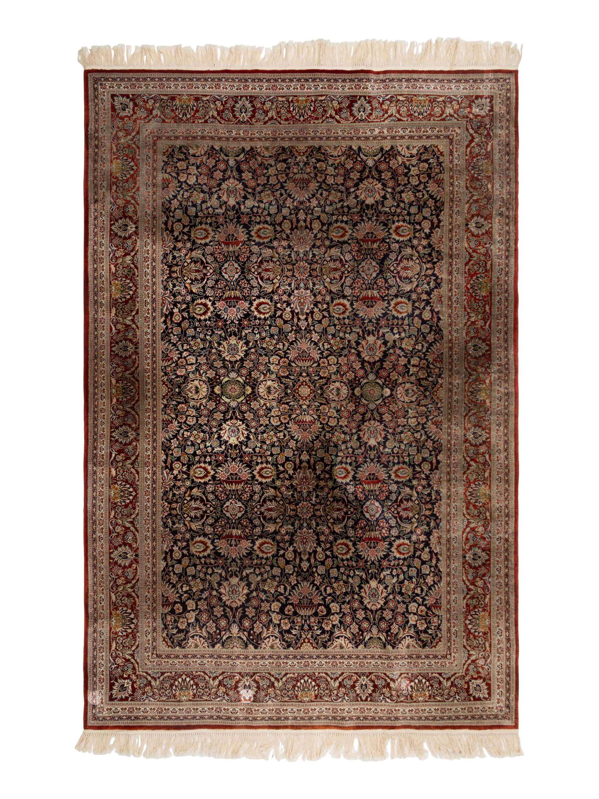A Silk Tabriz Rug