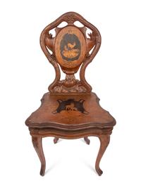 A Carved Black Forest Musical Child's Chair