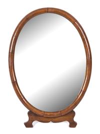 A George III Mahogany Oval Easel Back Dressing Mirror Height 20 3/4 x width 14 1/4 inches. — 19TH CENTURY
