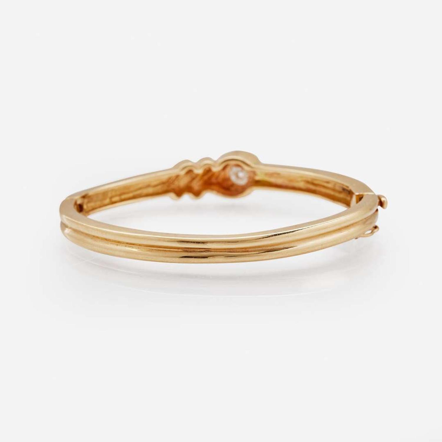 A 14K Yellow Gold and Diamond Bracelet
