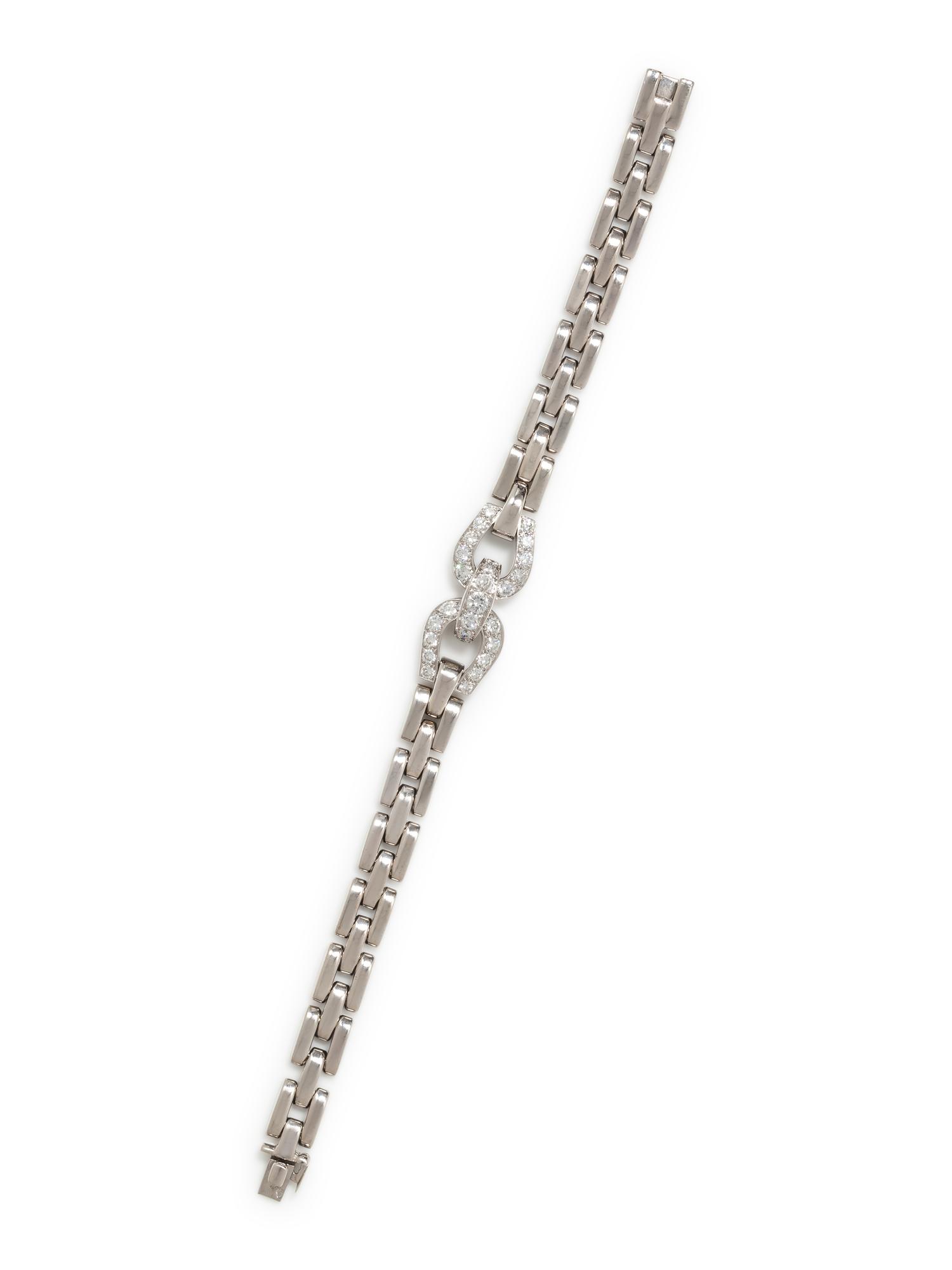 CARTIER, WHITE GOLD AND DIAMOND 'ETRIER' BRACELET