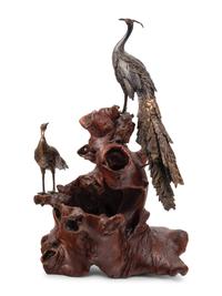 A Bronze Figural Group of Two Peacocks