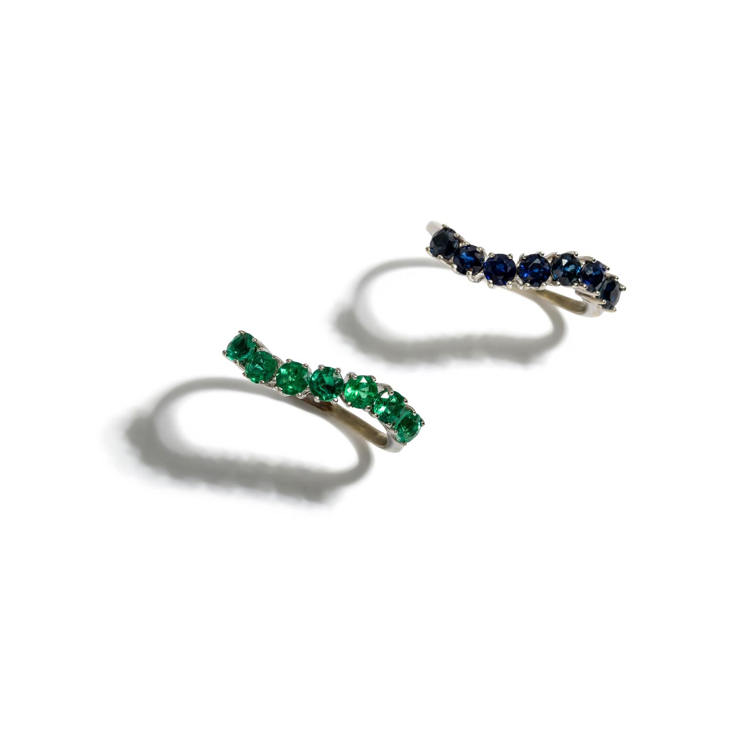 PAIR OF WHITE GOLD, SAPPHIRE, AND SYNTHETIC EMERALD RINGS