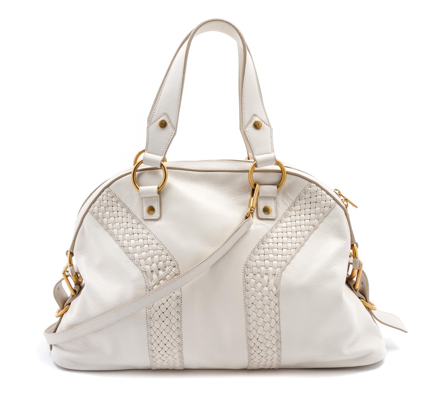 An Yves Saint Laurent Ivory Leather Muse Bag, 16 x 9 1/2 x 5 inches.