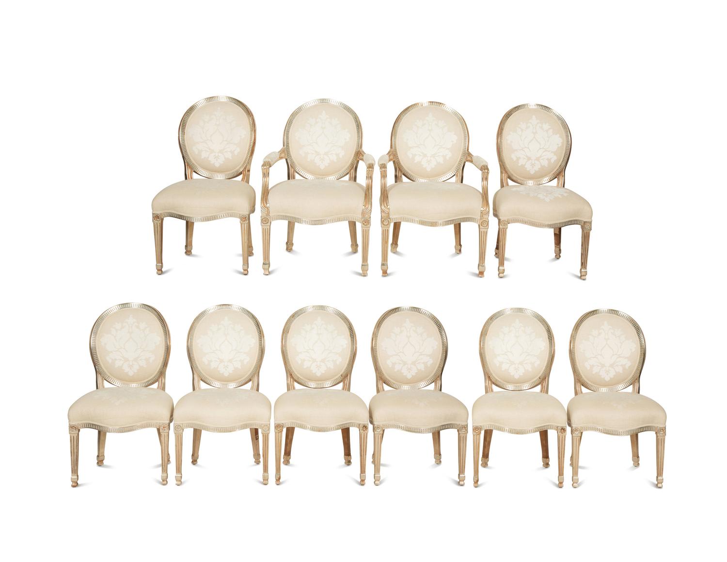 A Set of Twelve George III Style Silvered Wood Dining Chairs
