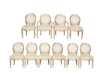 A Set of Twelve George III Style Silvered Wood Dining Chairs