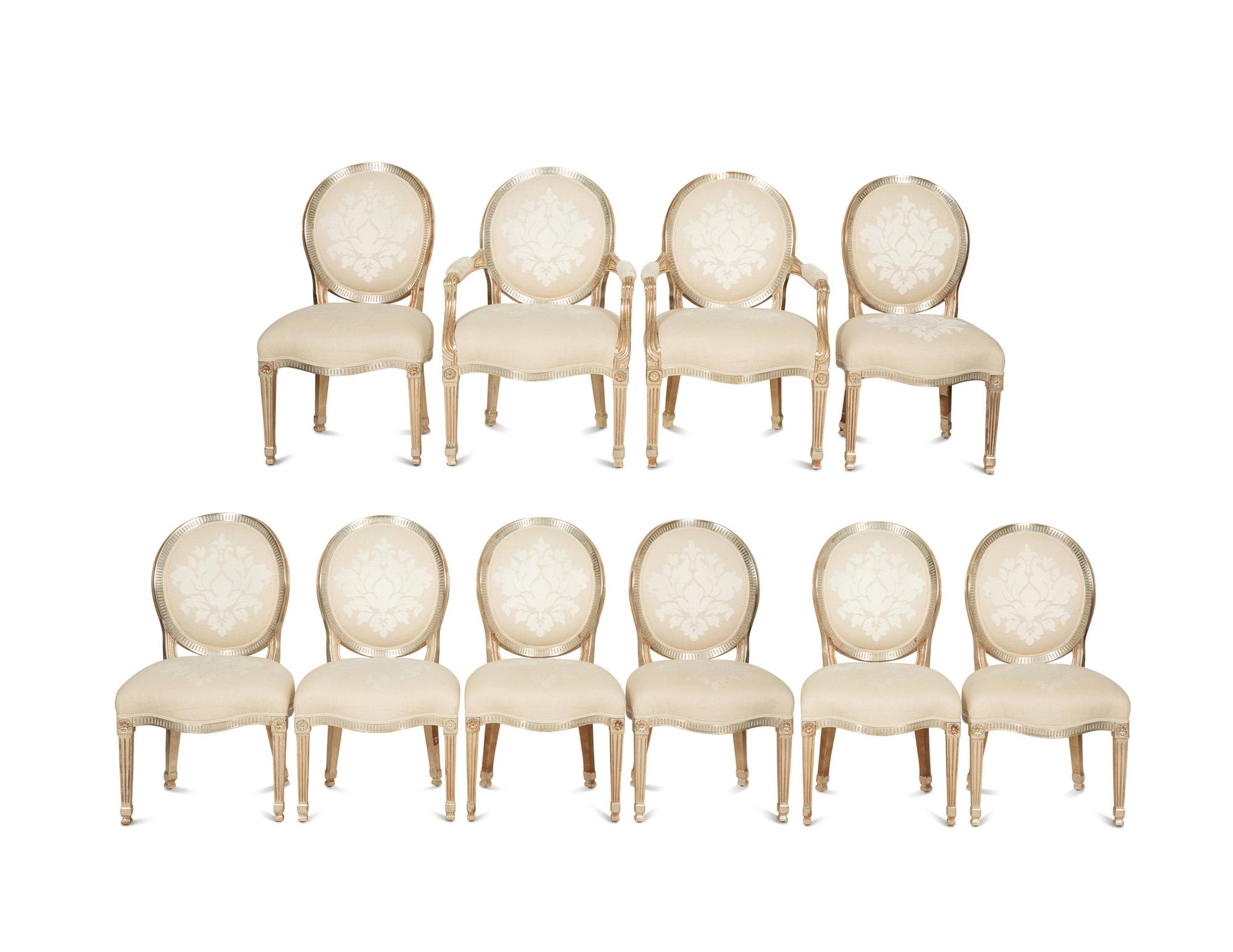 A Set of Twelve George III Style Silvered Wood Dining Chairs