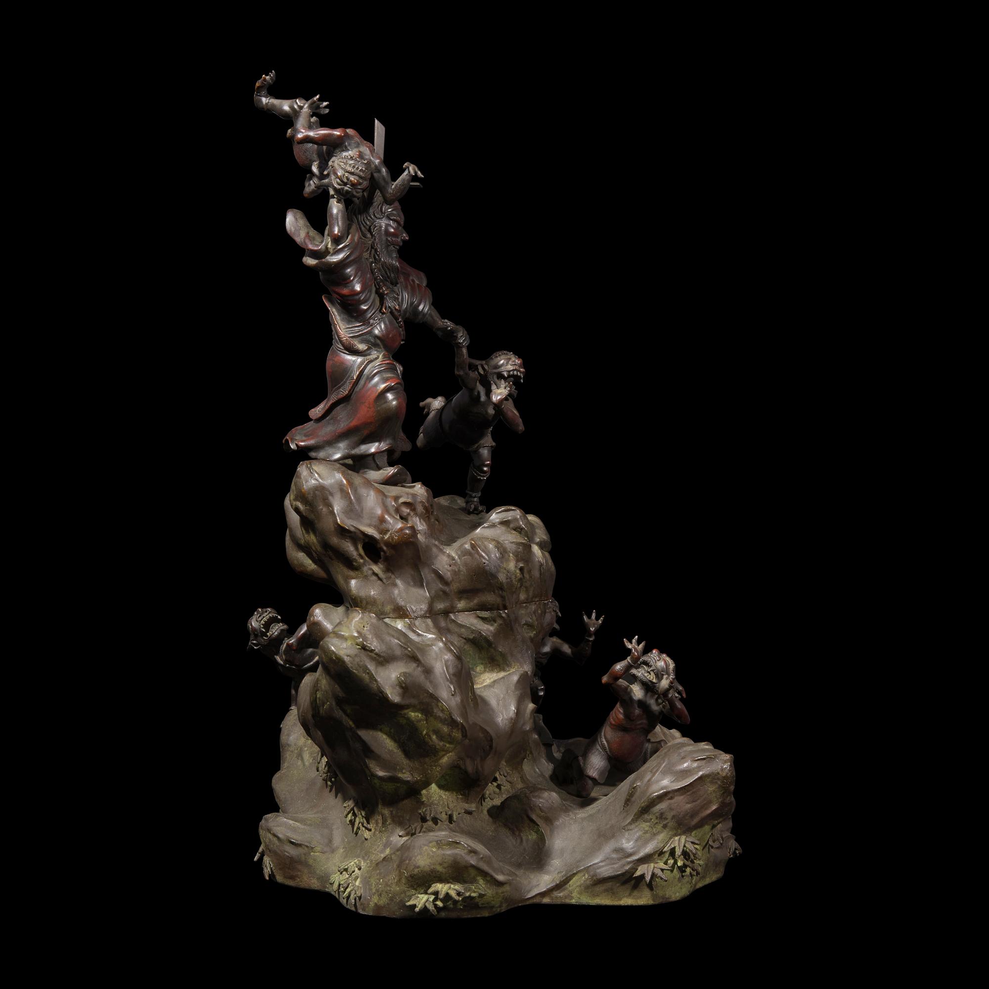 A Japanese Patinated Bronze and Metal S hoki and Oni Figural Koro, Meiji Period 日本明治時代 銅雕鍾馗捉鬼