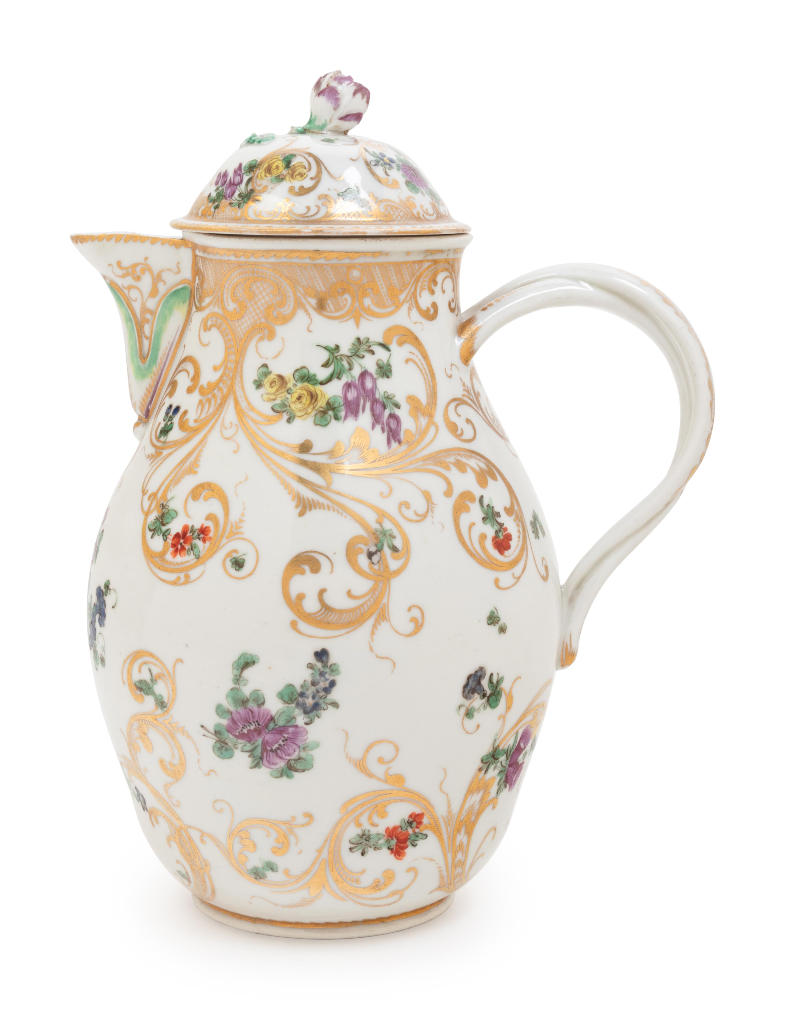 A Bristol Porcelain Covered Milk Jug
