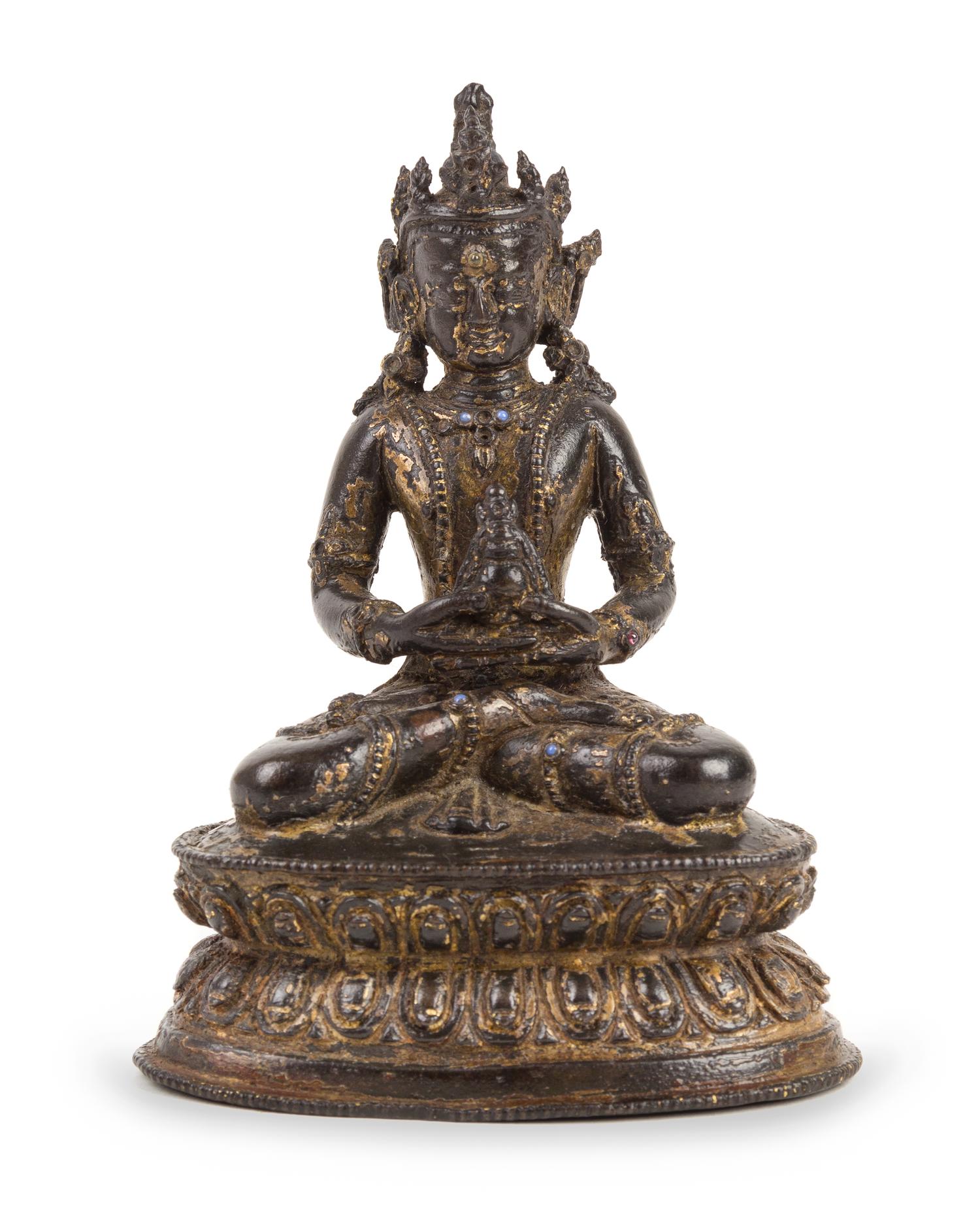 A Nepalese Partial Gilt Bronze Figure of Amida Buddha Height 5 inches. — 15TH/16TH CENTURY