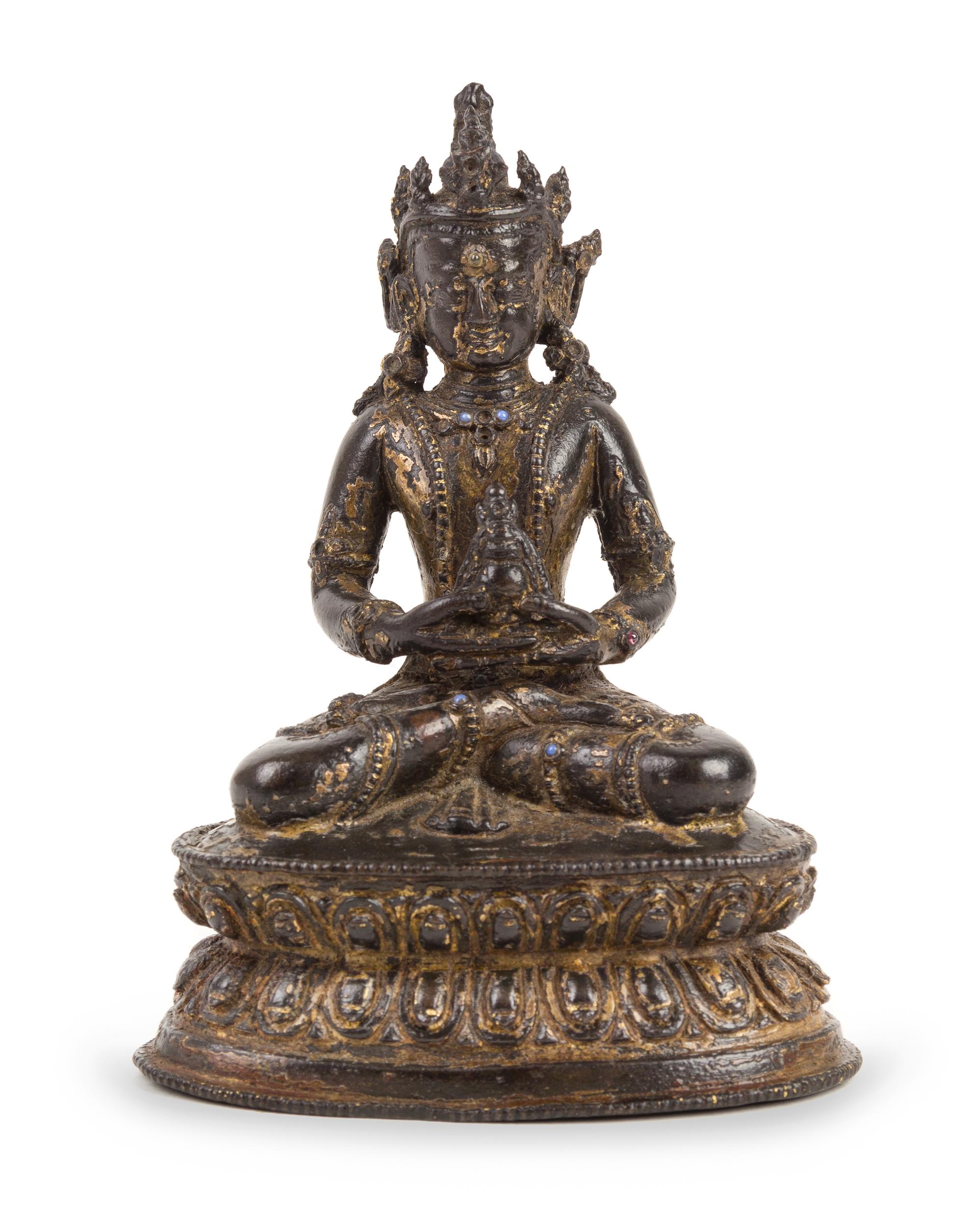A Nepalese Partial Gilt Bronze Figure of Amida Buddha Height 5 inches. — 15TH/16TH CENTURY