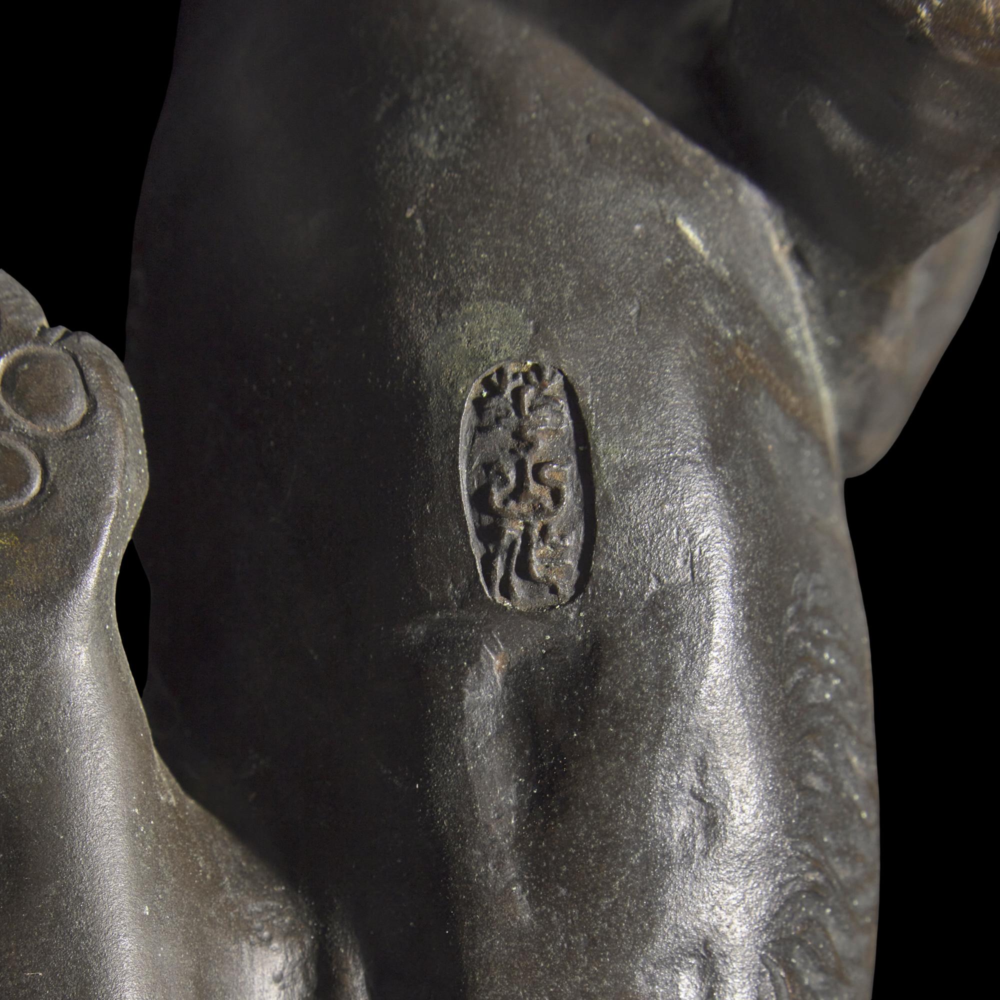 A Japanese Patinated Bronze 'Tigress and Cubs' Okimono, Meiji/Taisho Period