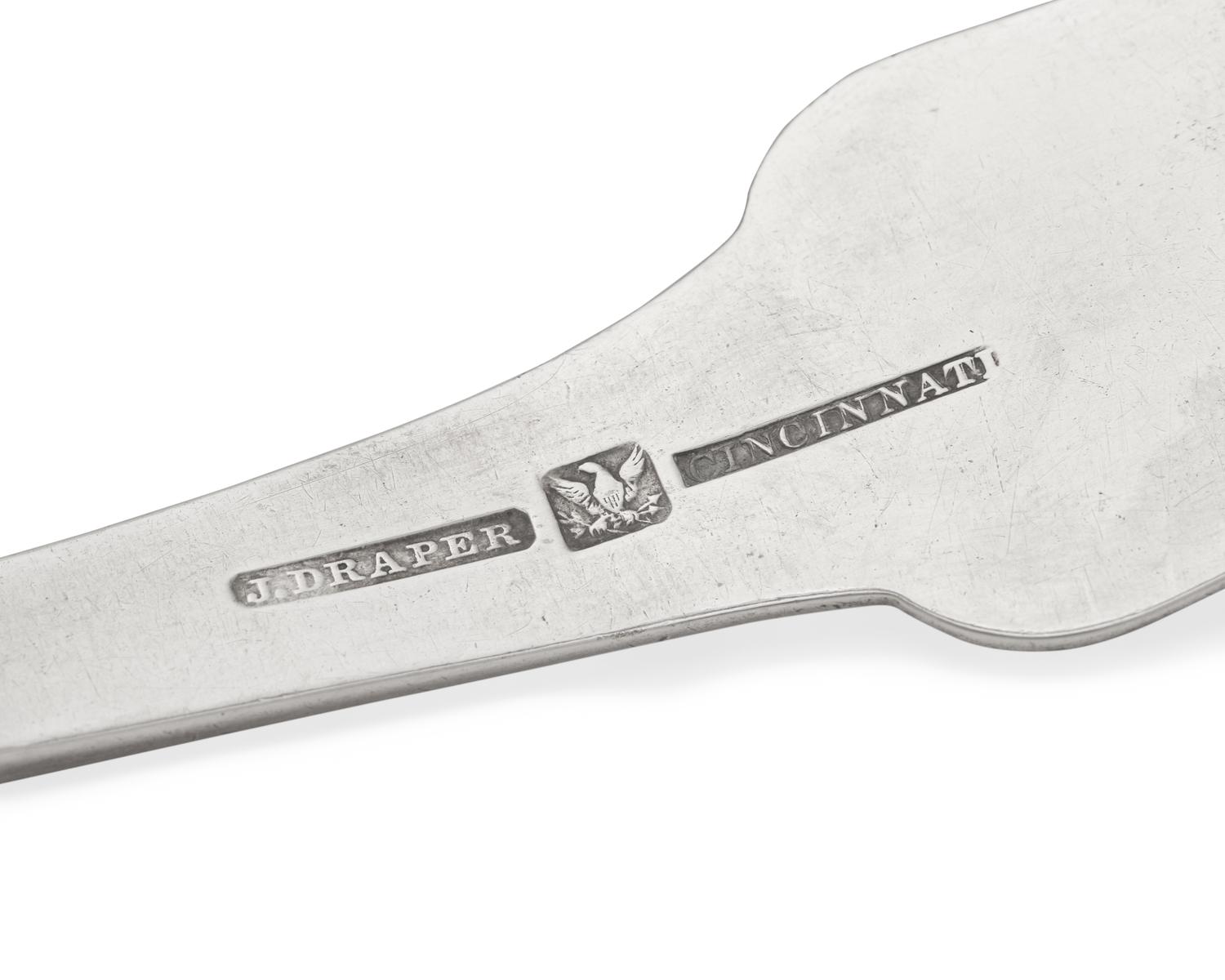 A Silver Punch Ladle and Two Silver Sugar Tongs