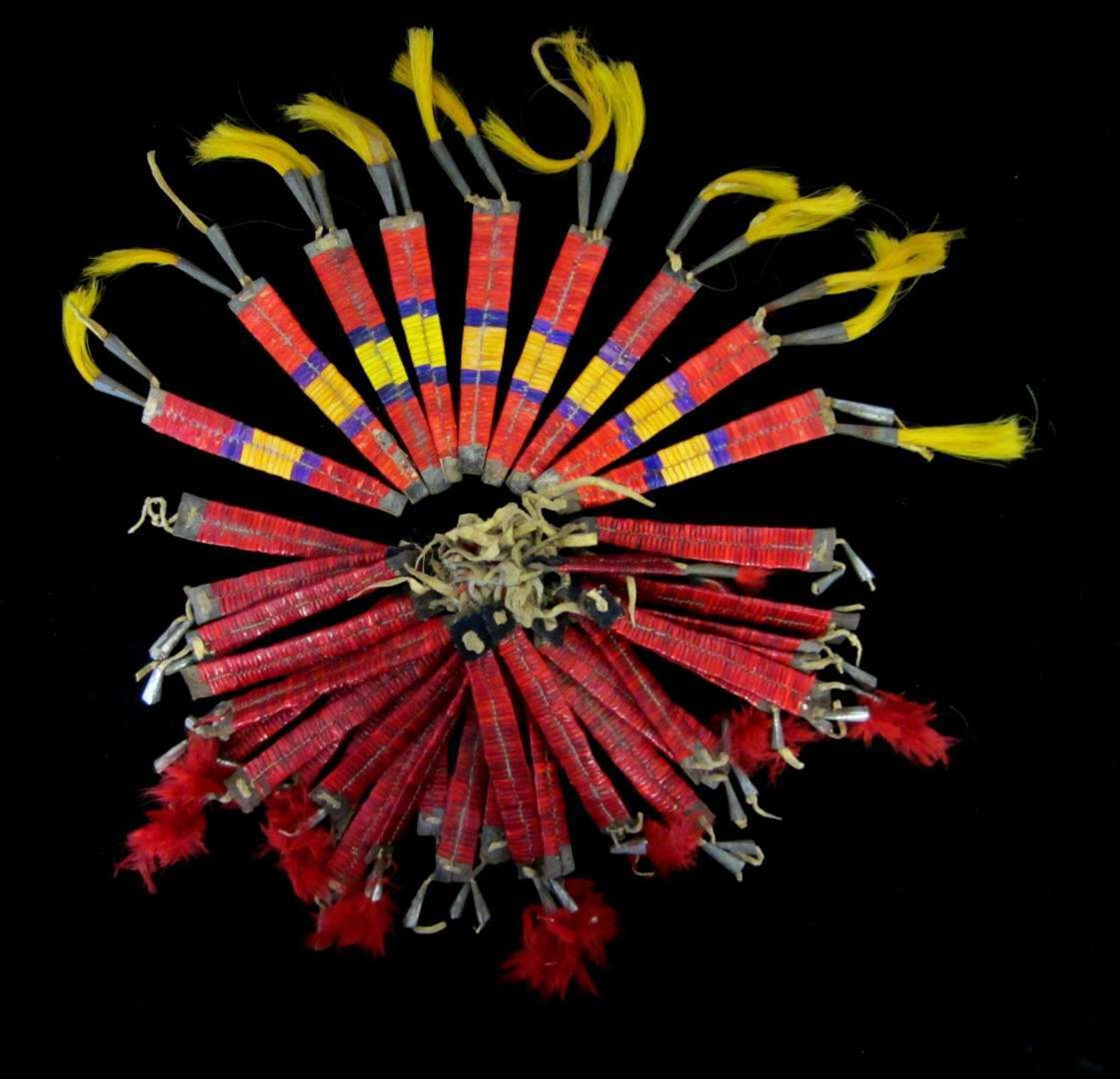 Canvas teepee and group of quilled hide teepee decorations first half 19th century