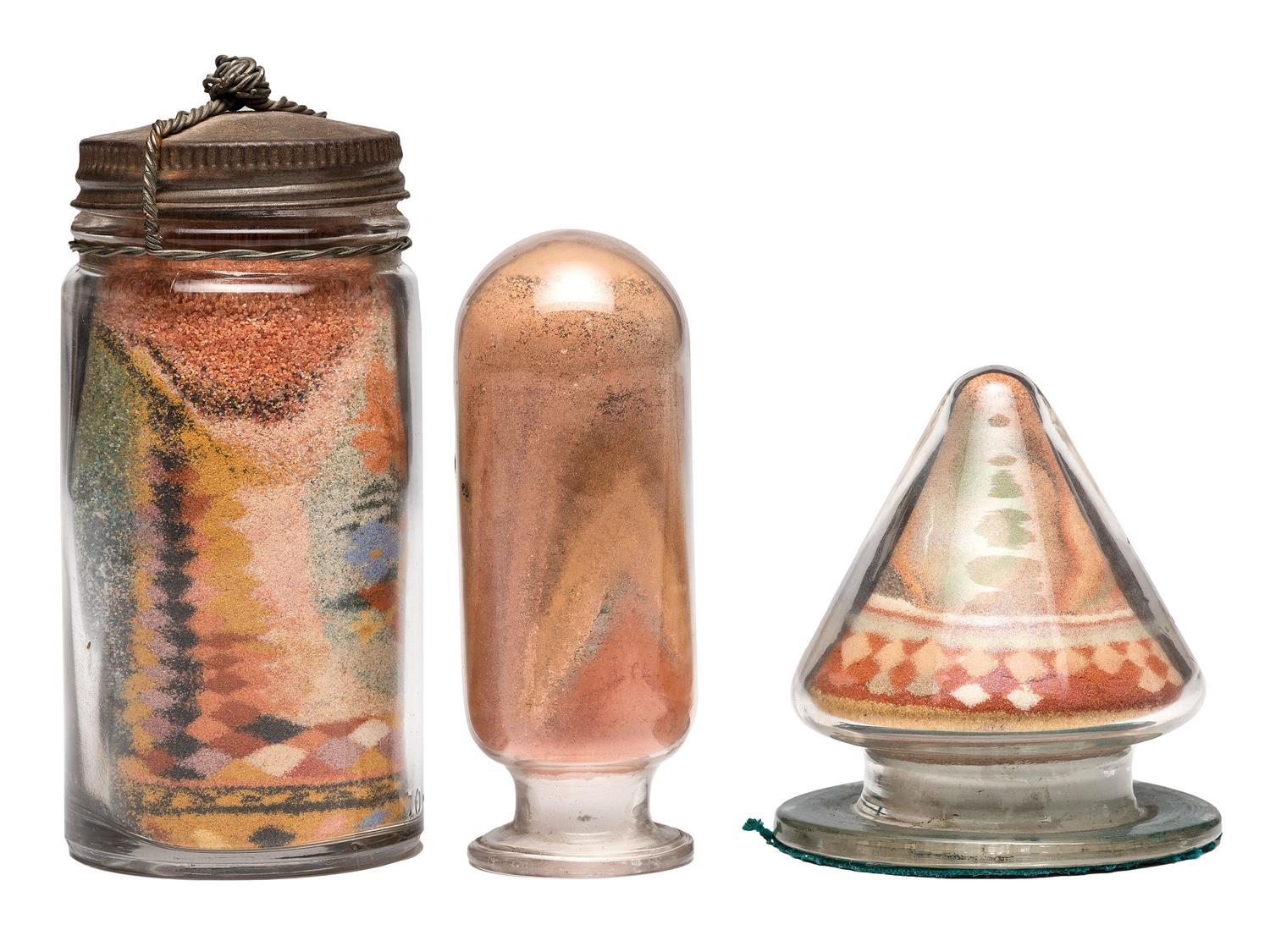A Collection of John A. Adams Sand Art Bottles, Along with Custom Box and Unused Bottle